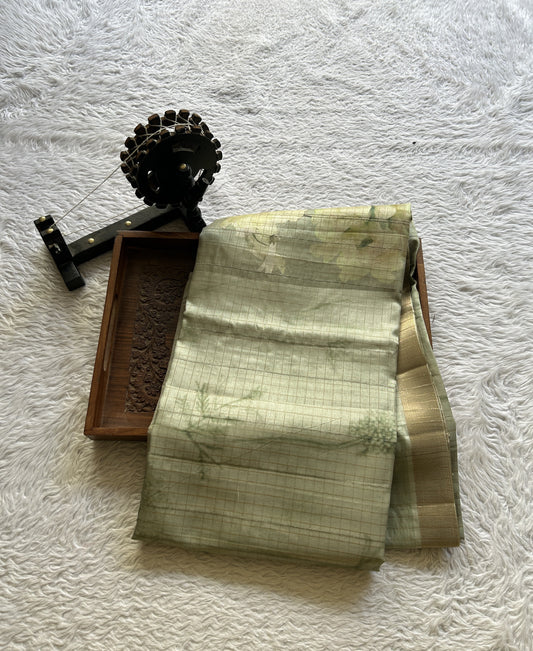 Semi Tussar Saree Mint Colored complemented with a Zari Border. - Sampradaya Designer Studio