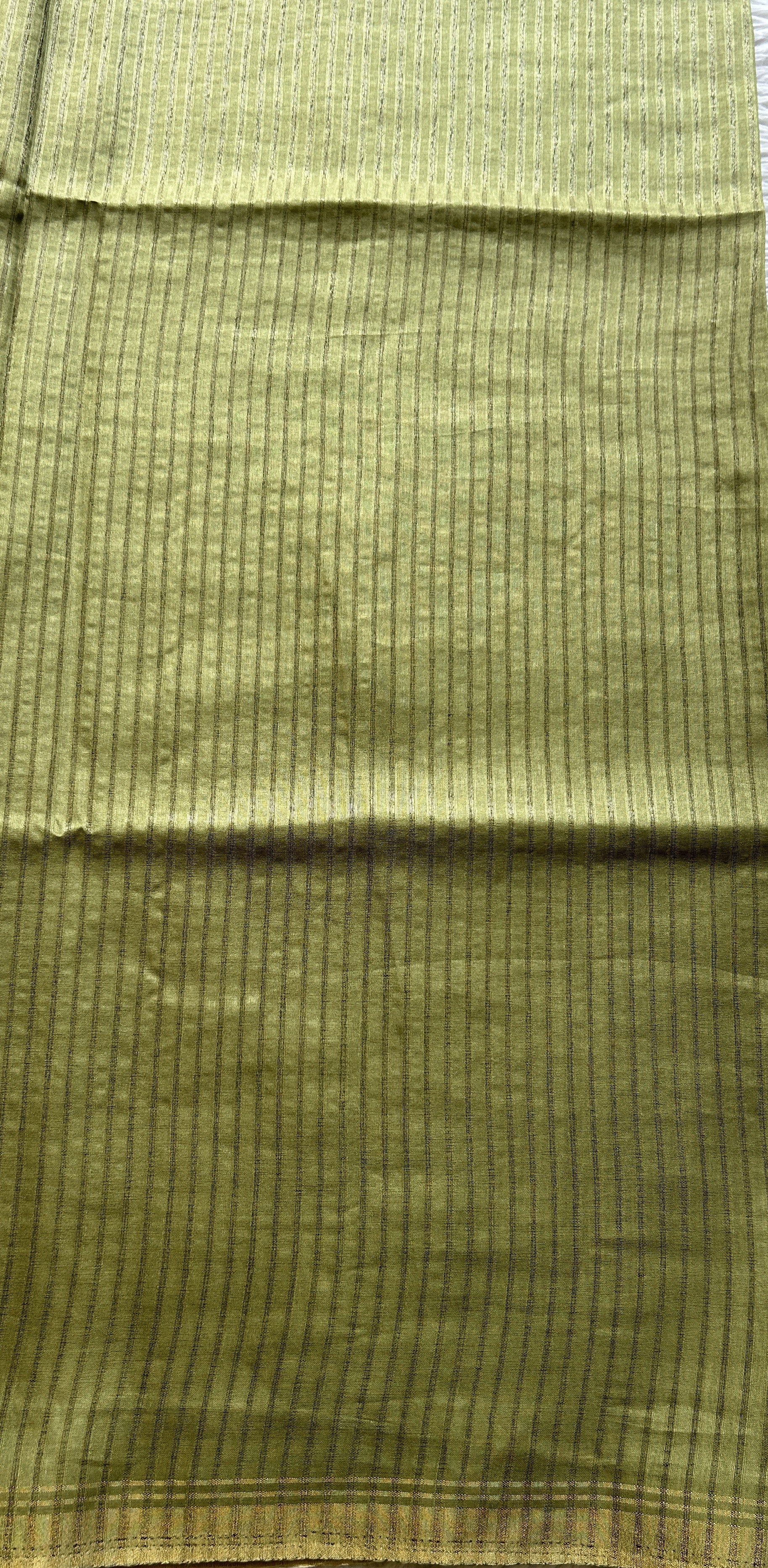 Semi Tussar Saree Avocado Colored complemented with a Zari Border. - Sampradaya Designer Studio