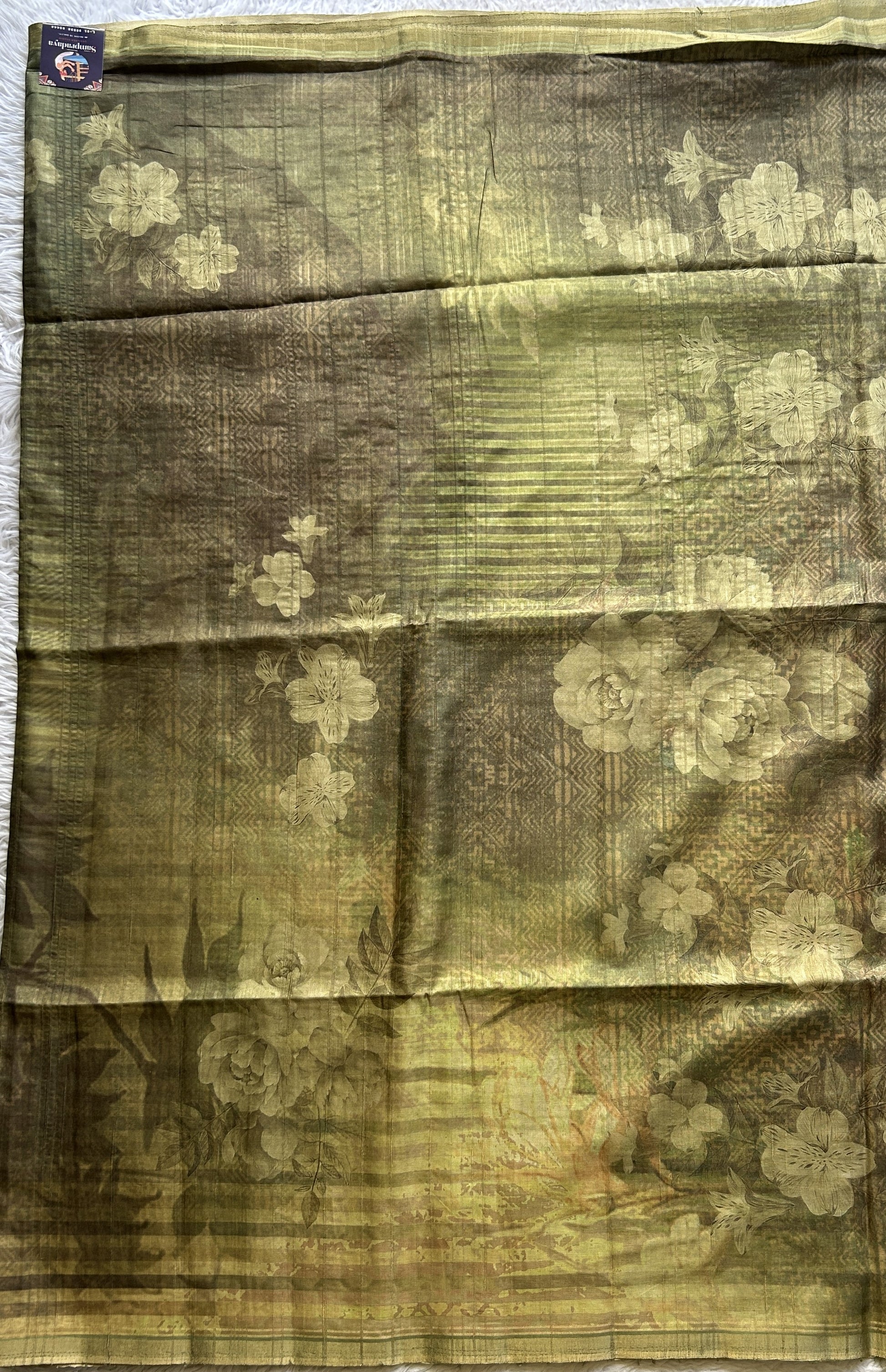 Semi Tussar Saree Avocado Colored complemented with a Zari Border. - Sampradaya Designer Studio