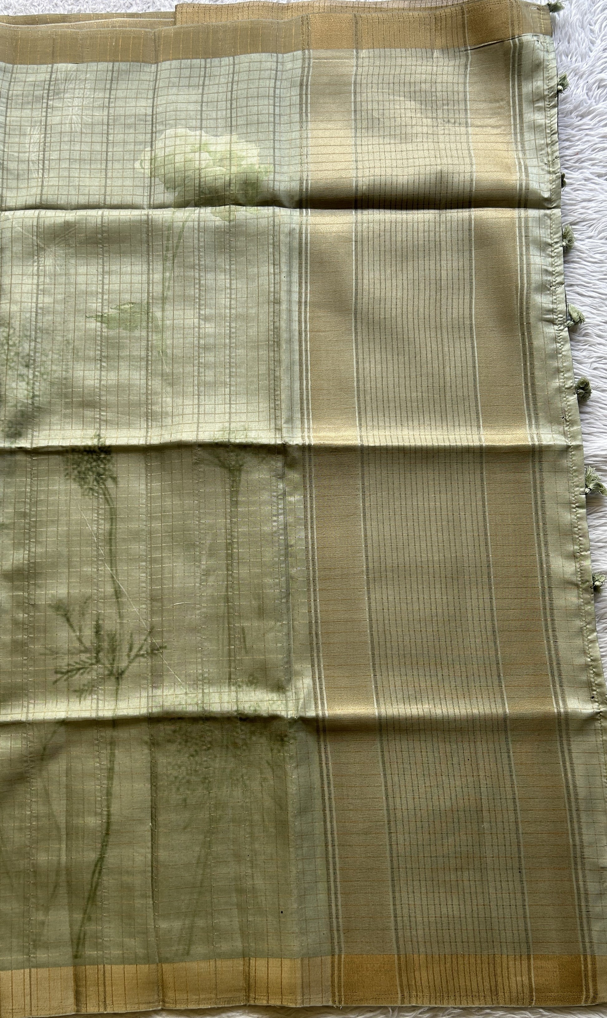 Semi Tussar Saree Mint Colored complemented with a Zari Border. - Sampradaya Designer Studio