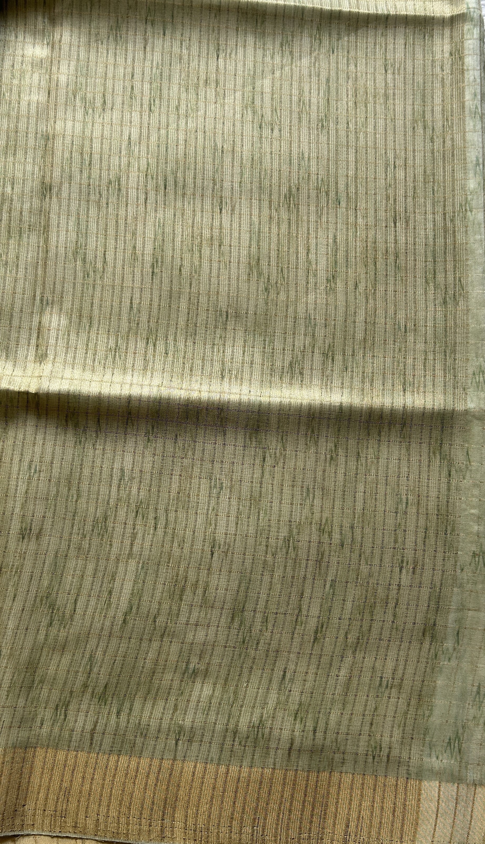 Semi Tussar Saree Mint Colored complemented with a Zari Border. - Sampradaya Designer Studio