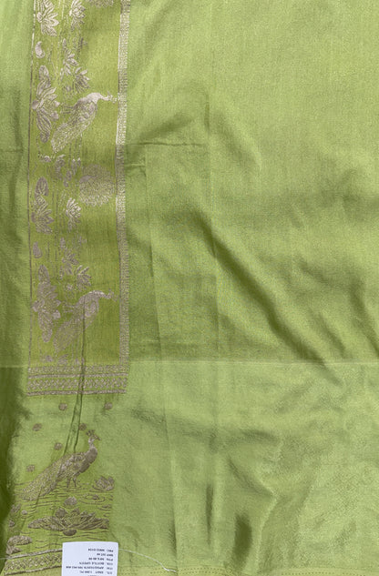 Banarasi Fancy Saree Bottle Green Colored Complemented with a Light Green Zari Border.