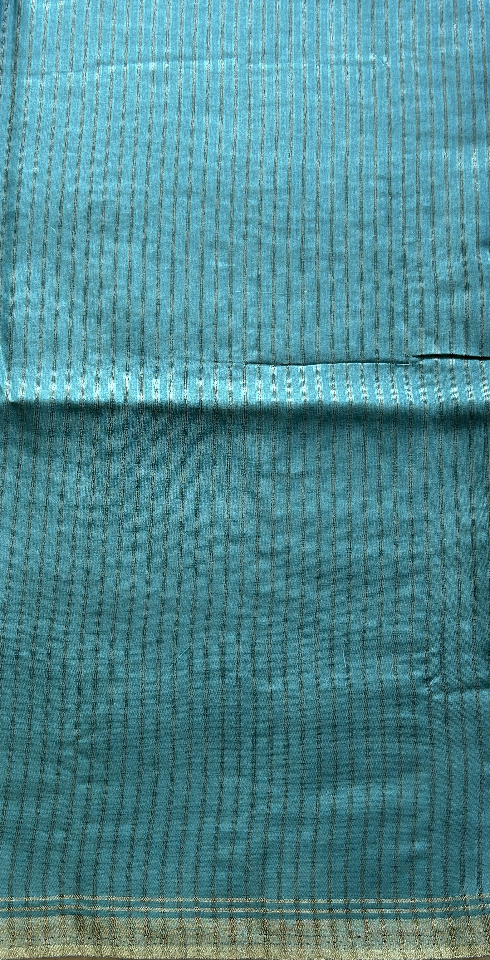 Semi Tussar Saree Blue Colored complemented with a Zari Border. - Sampradaya Designer Studio