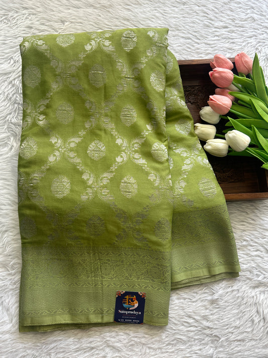 Semi Georgette Saree Light Green Colored Complemented with a Zari Border. - Sampradaya Designer Studio