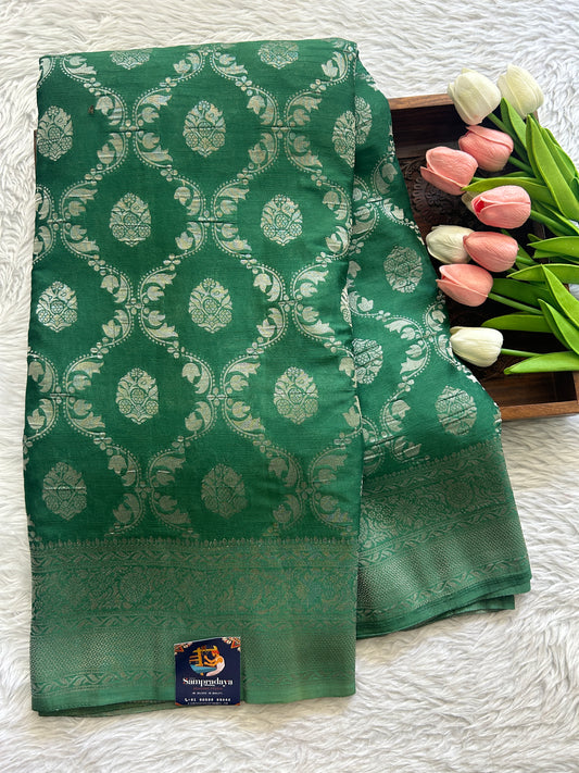Semi Georgette Saree Green Colored Complemented with a Zari Border. - Sampradaya Designer Studio