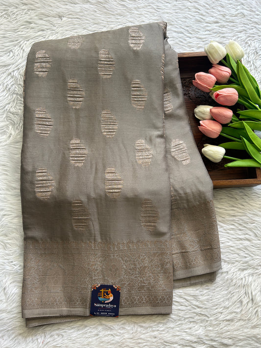 Semi Georgette Saree Gray Colored Complemented with a Zari Border. - Sampradaya Designer Studio