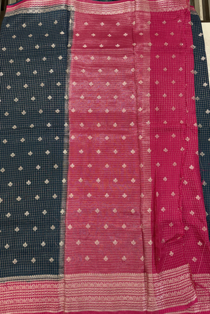 Banarasi Fancy Saree Dark Teal Blue Colored Complemented with a Yellow Zari Border.