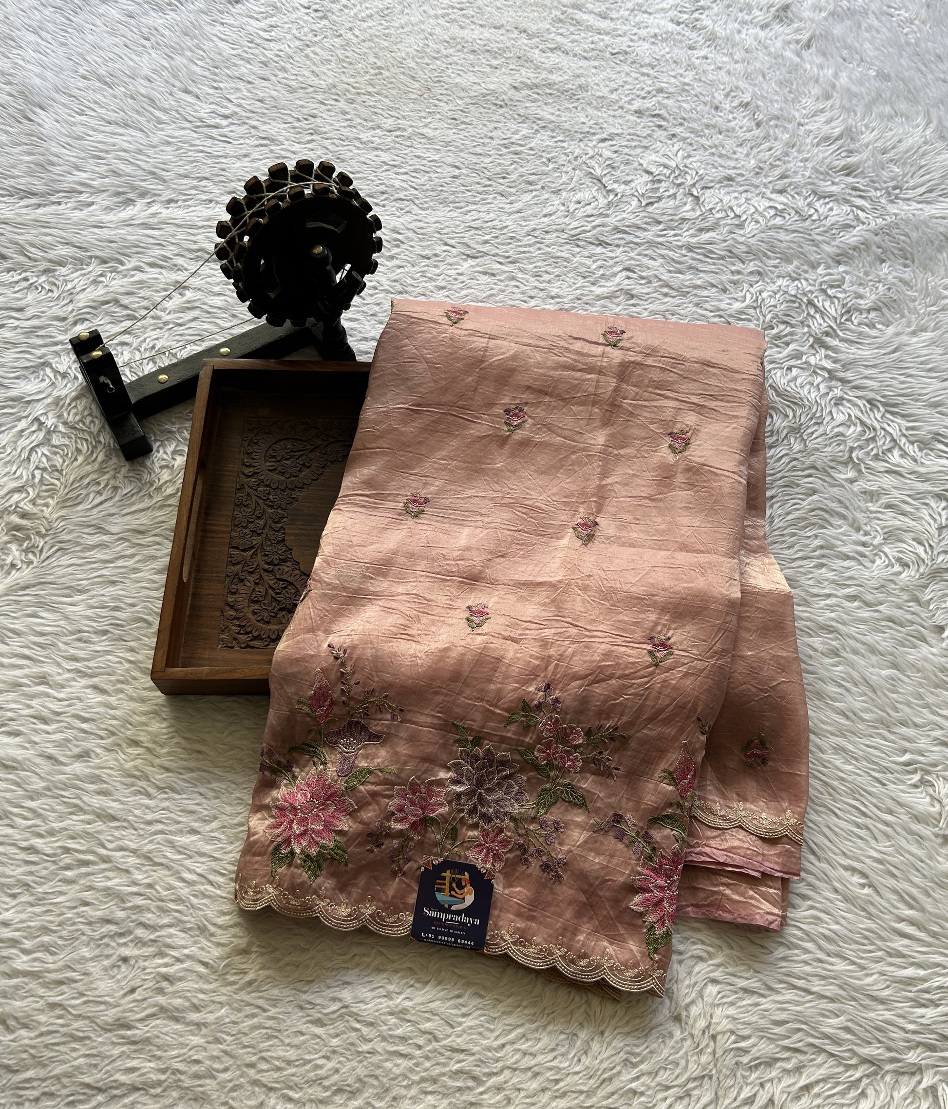 Inox Silk Saree Melon Colored Elegantly Paired with a Machine Embroidery Border. - Sampradaya Designer Studio