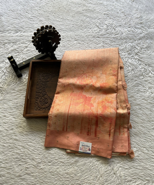 Semi Tussar Saree Pale Orange Colored complemented with a Plain Border. - Sampradaya Designer Studio