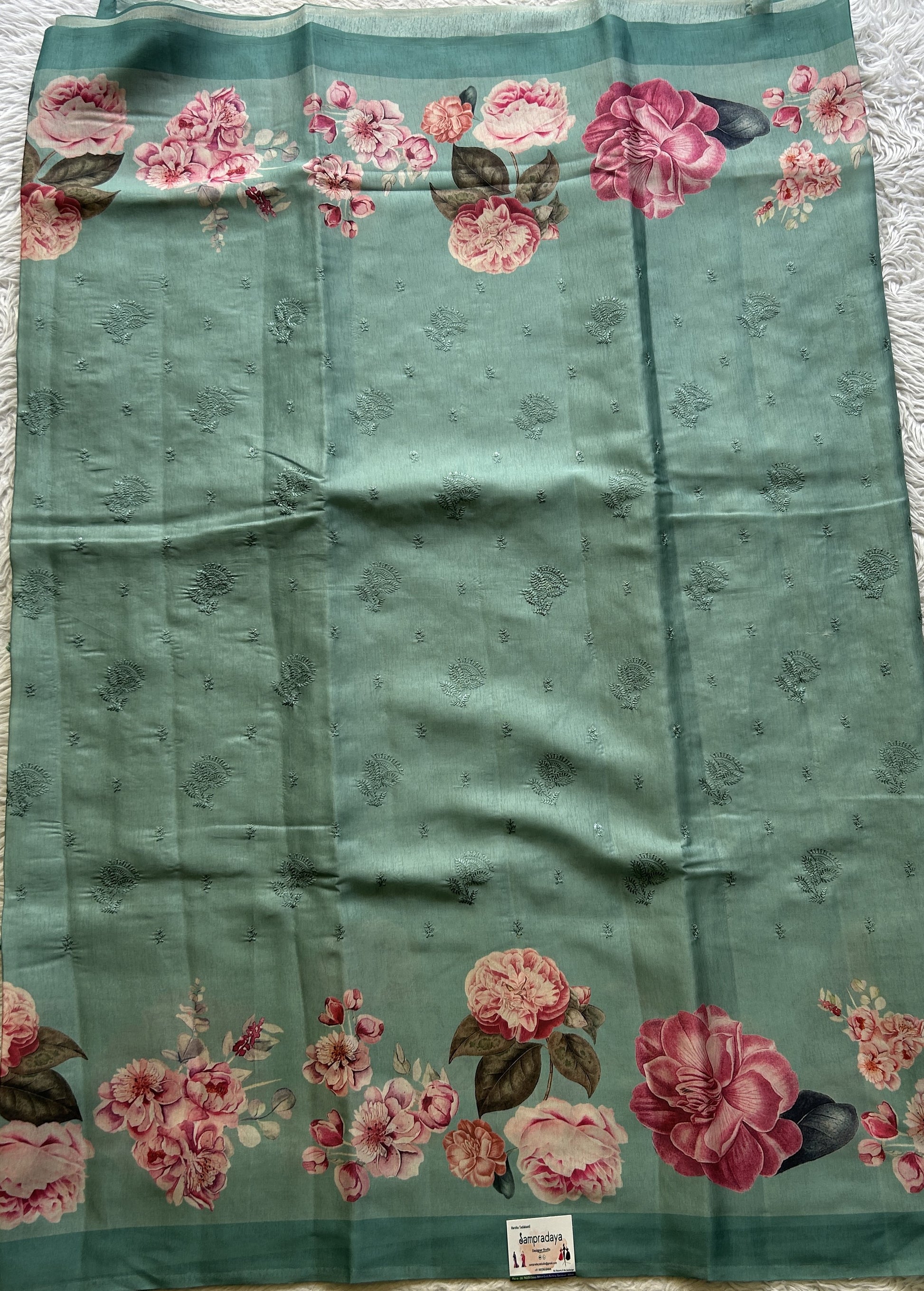 Banarasi Soft Silk Saree Aqua Green Colored Complemented with a Plain Border. - Sampradaya Designer Studio