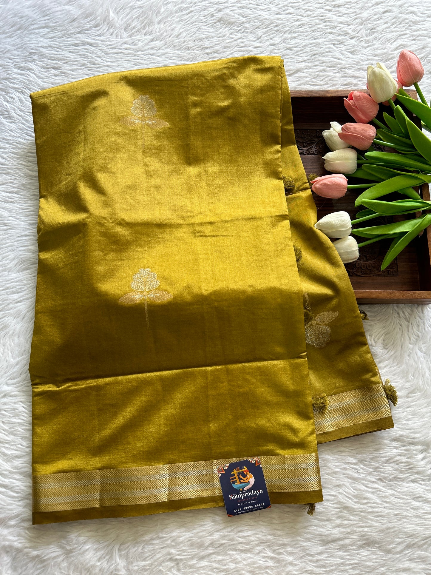 Semi Raw Silk Saree Olive Green Colored Complemented with a Zari Border. - Sampradaya Designer Studio