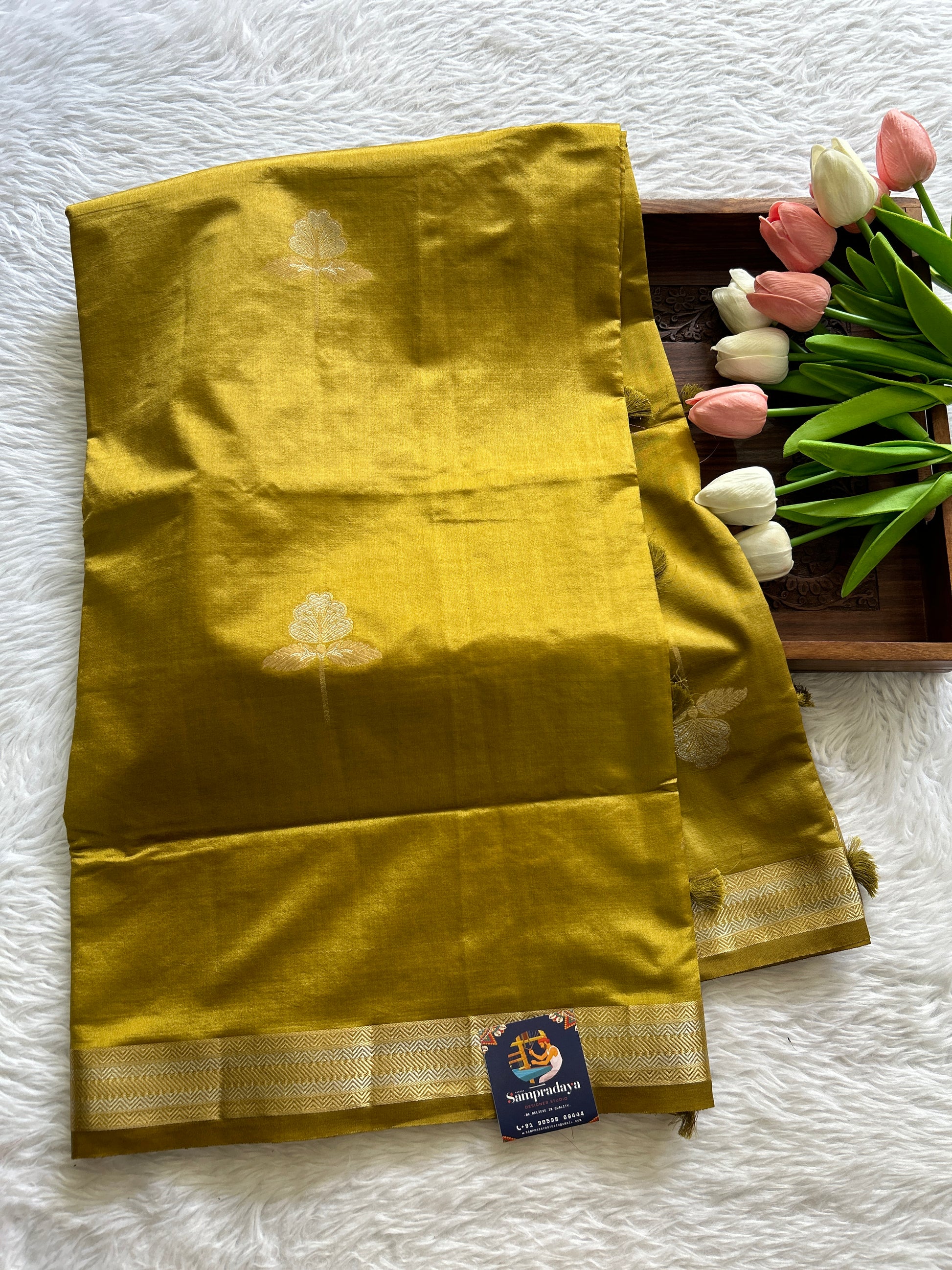 Semi Raw Silk Saree Olive Green Colored Complemented with a Zari Border. - Sampradaya Designer Studio