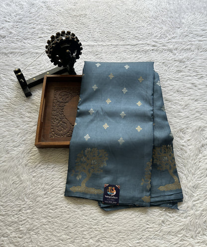 Mona Silk Saree Teal Blue Colored Complemented with a Buti Border. - Sampradaya Designer Studio