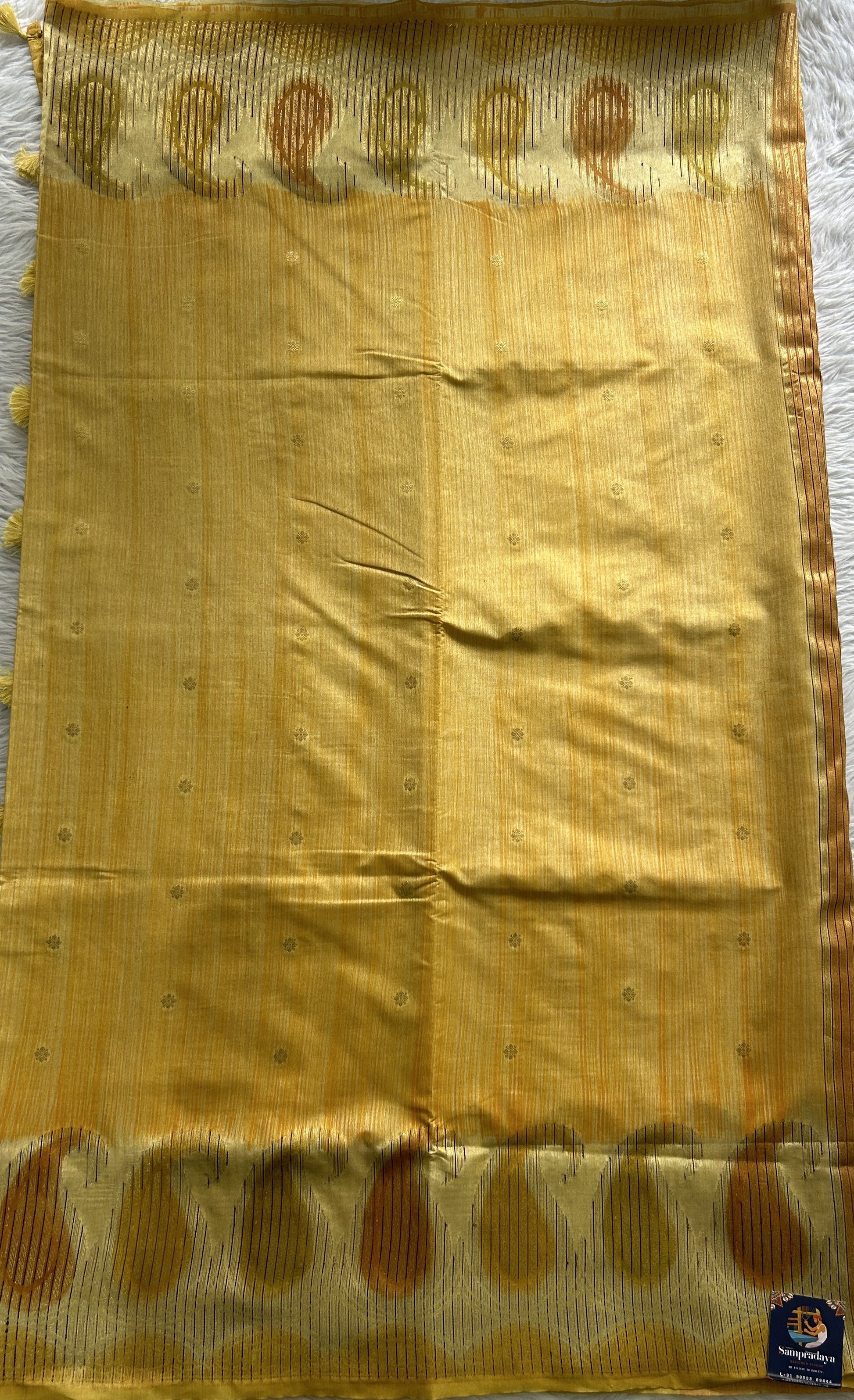 Semi Raw Silk Saree Yellow Colored Complemented with a Zari Border. - Sampradaya Designer Studio