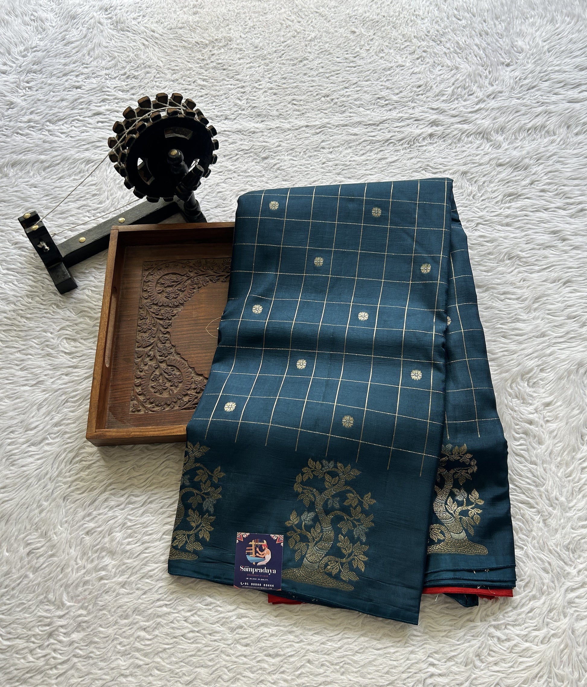 Mona Silk Checks Saree Peacock Blue Colored Complemented with a Buti Border. - Sampradaya Designer Studio
