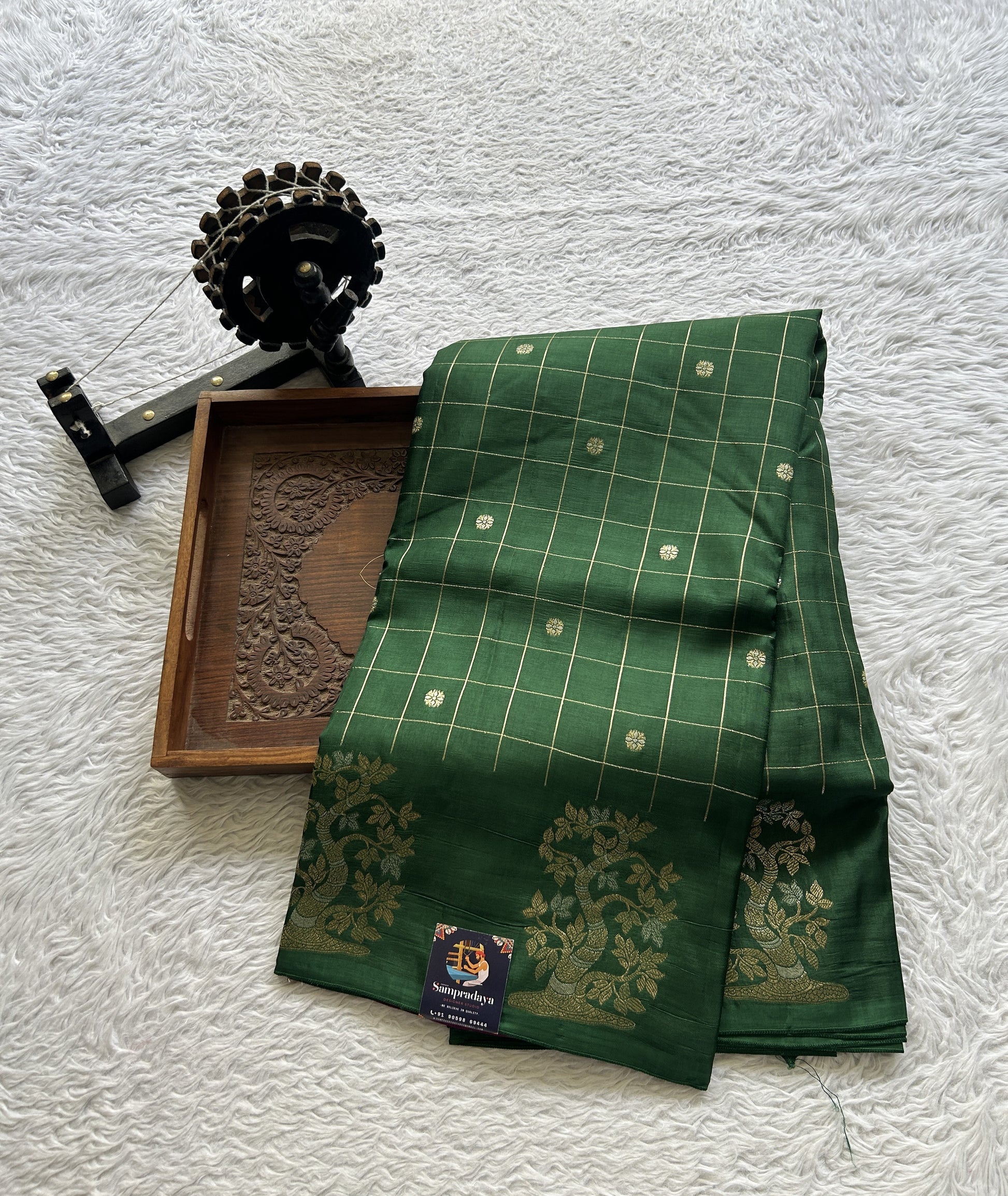 Mona Silk Checks Saree Dark Green Colored Complemented with a Buti Border. - Sampradaya Designer Studio