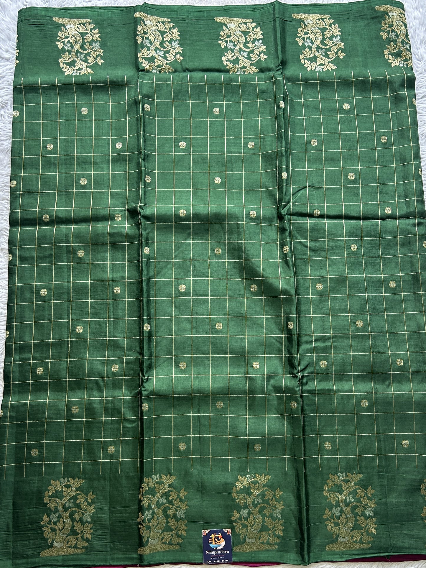 Mona Silk Checks Saree Dark Green Colored Complemented with a Buti Border. - Sampradaya Designer Studio