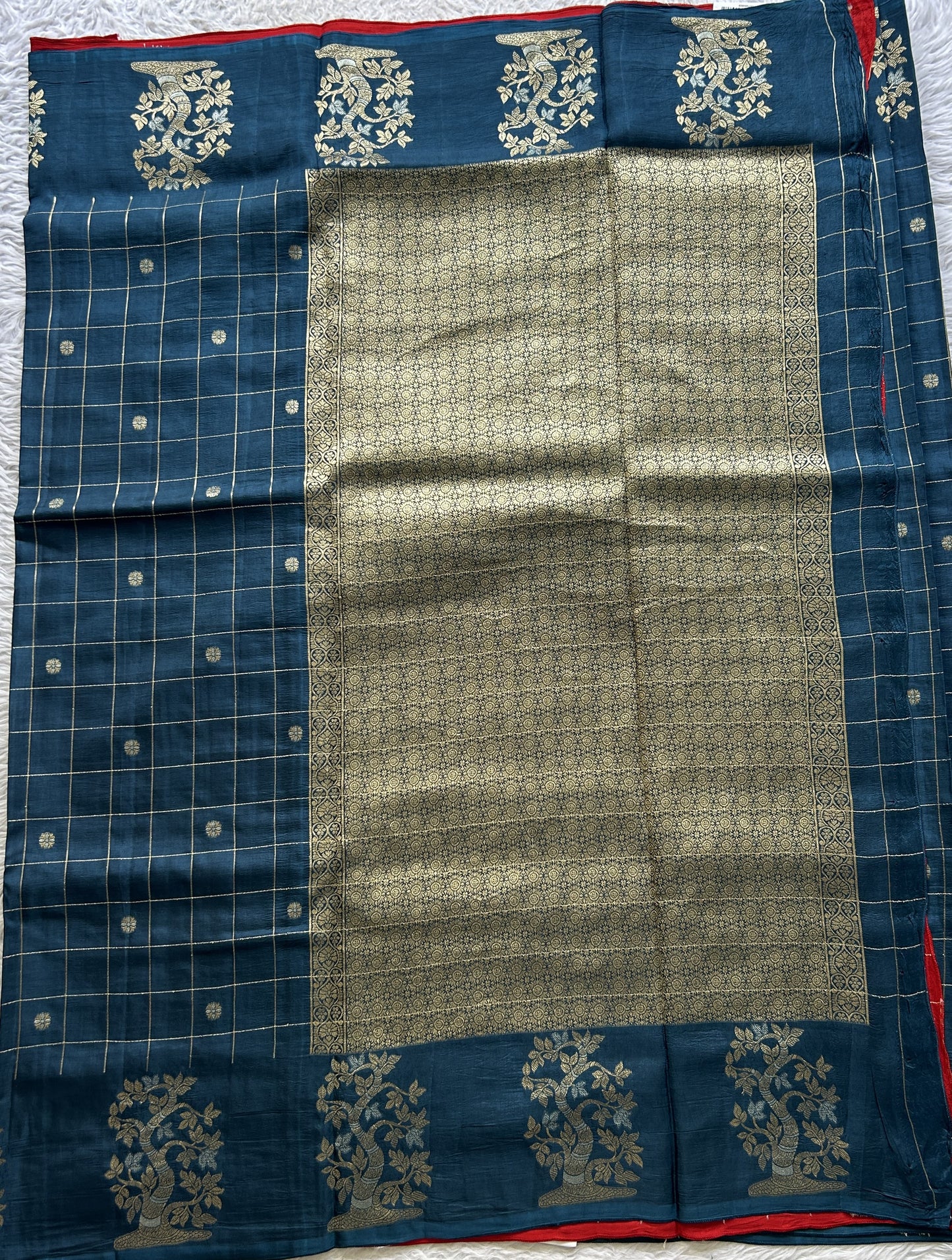 Mona Silk Checks Saree Peacock Blue Colored Complemented with a Buti Border. - Sampradaya Designer Studio