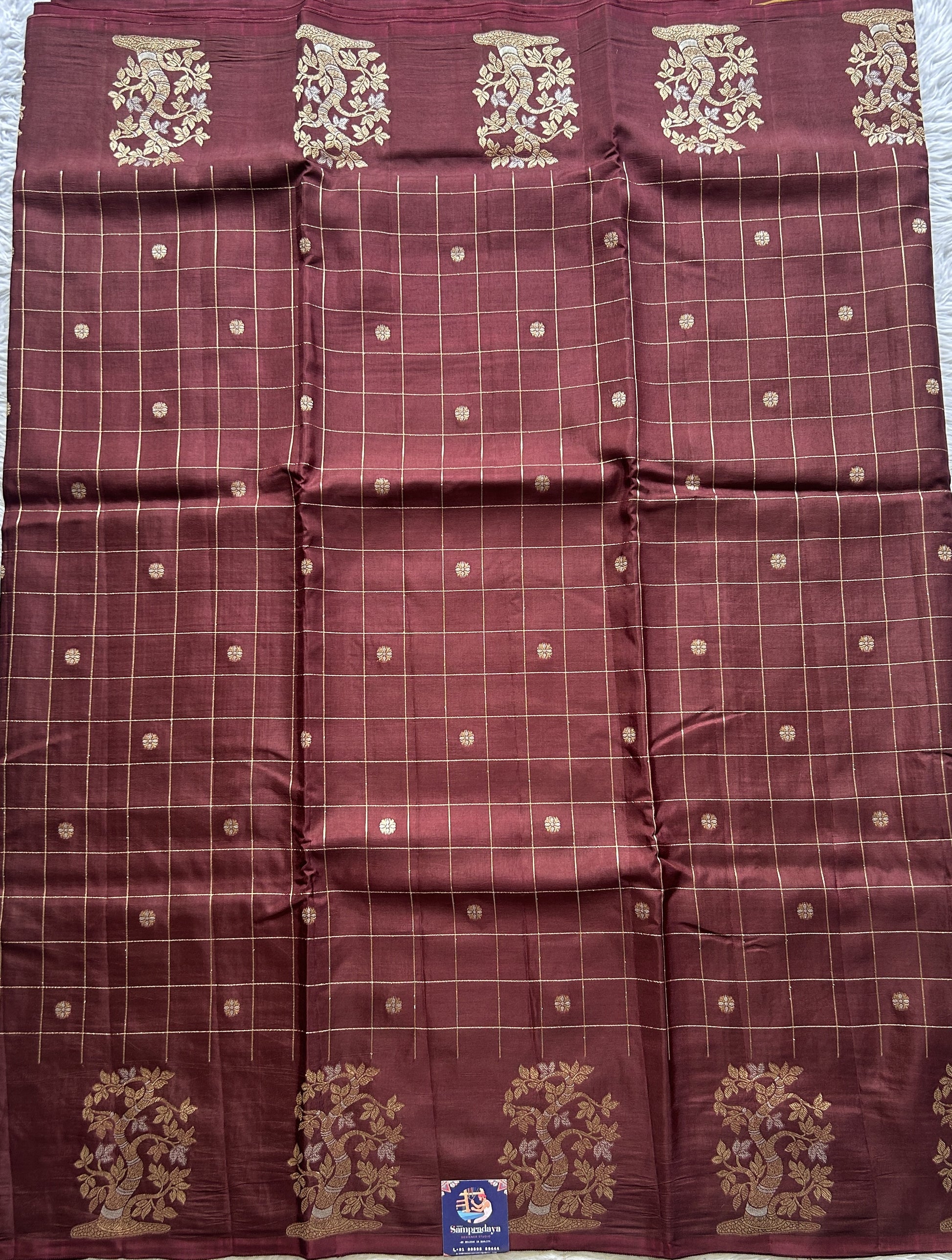 Mona Silk Checks Saree Brown Colored Complemented with a Buti Border. - Sampradaya Designer Studio