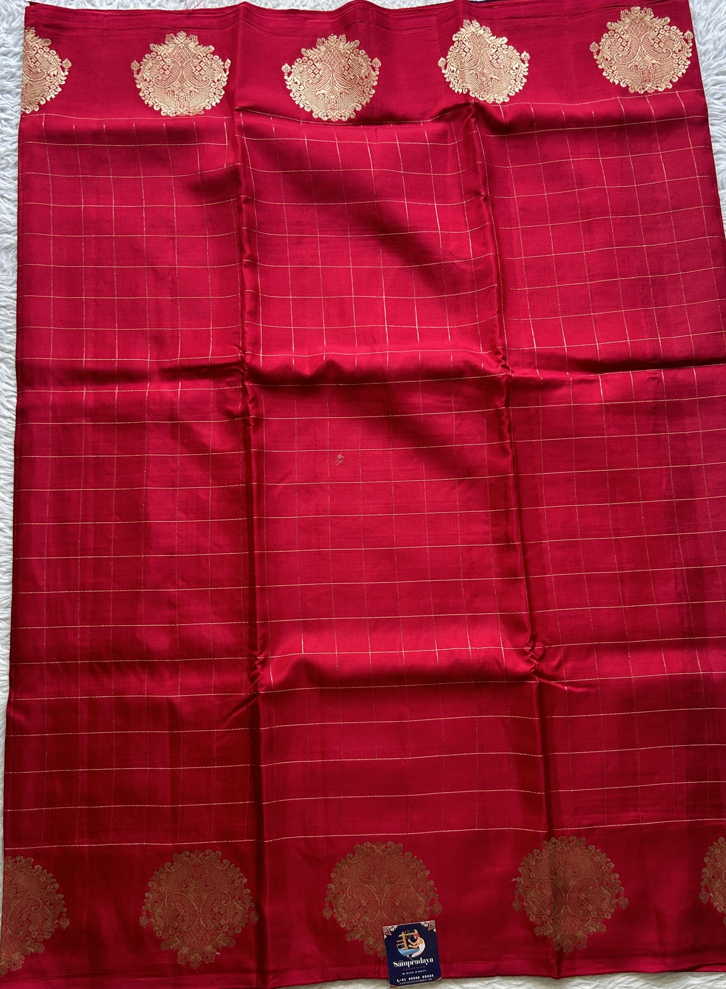 Mona Silk Checks Saree Pink Colored Complemented with a Buti Border. - Sampradaya Designer Studio