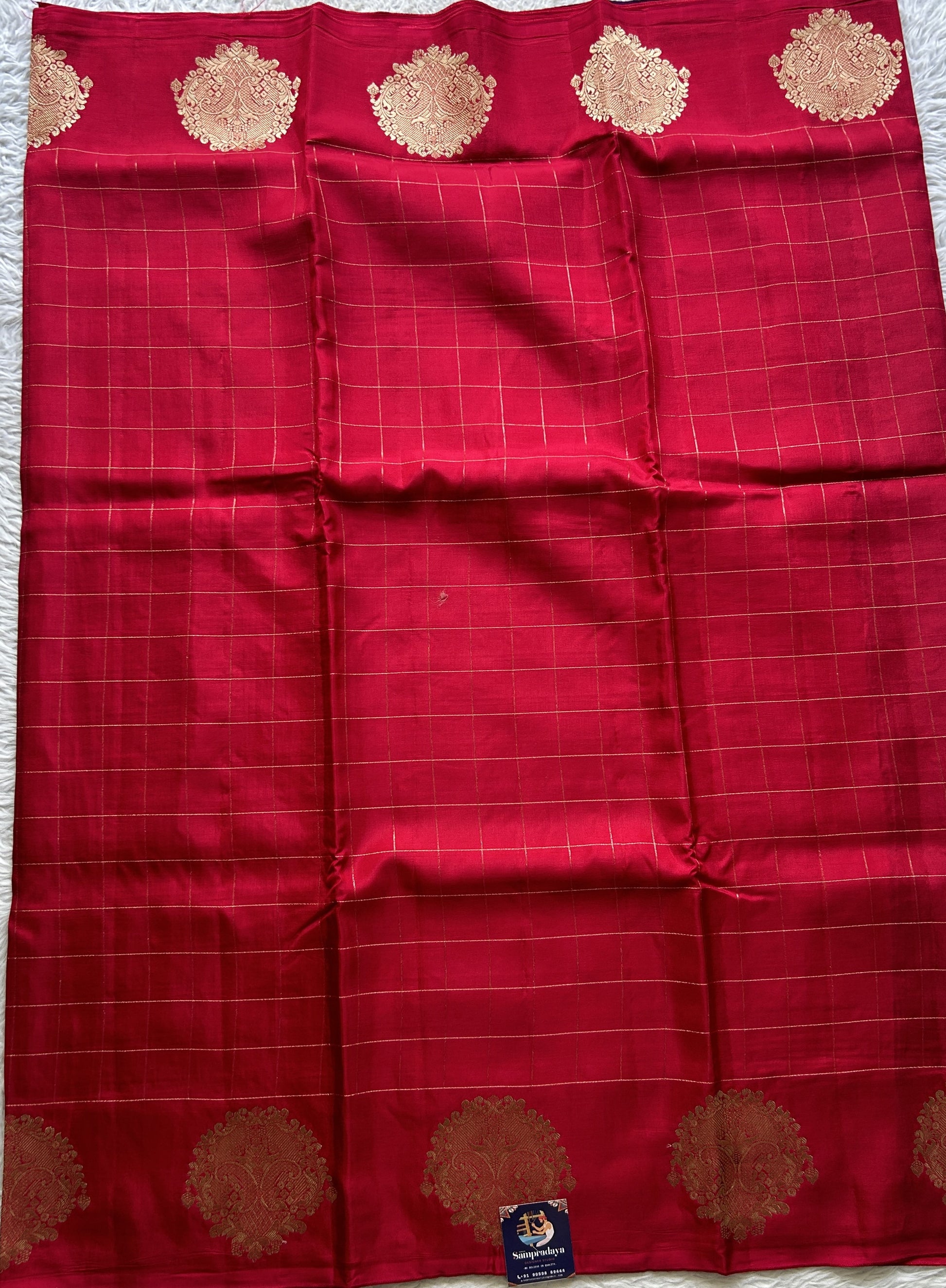 Mona Silk Checks Saree Pink Colored Complemented with a Buti Border. - Sampradaya Designer Studio