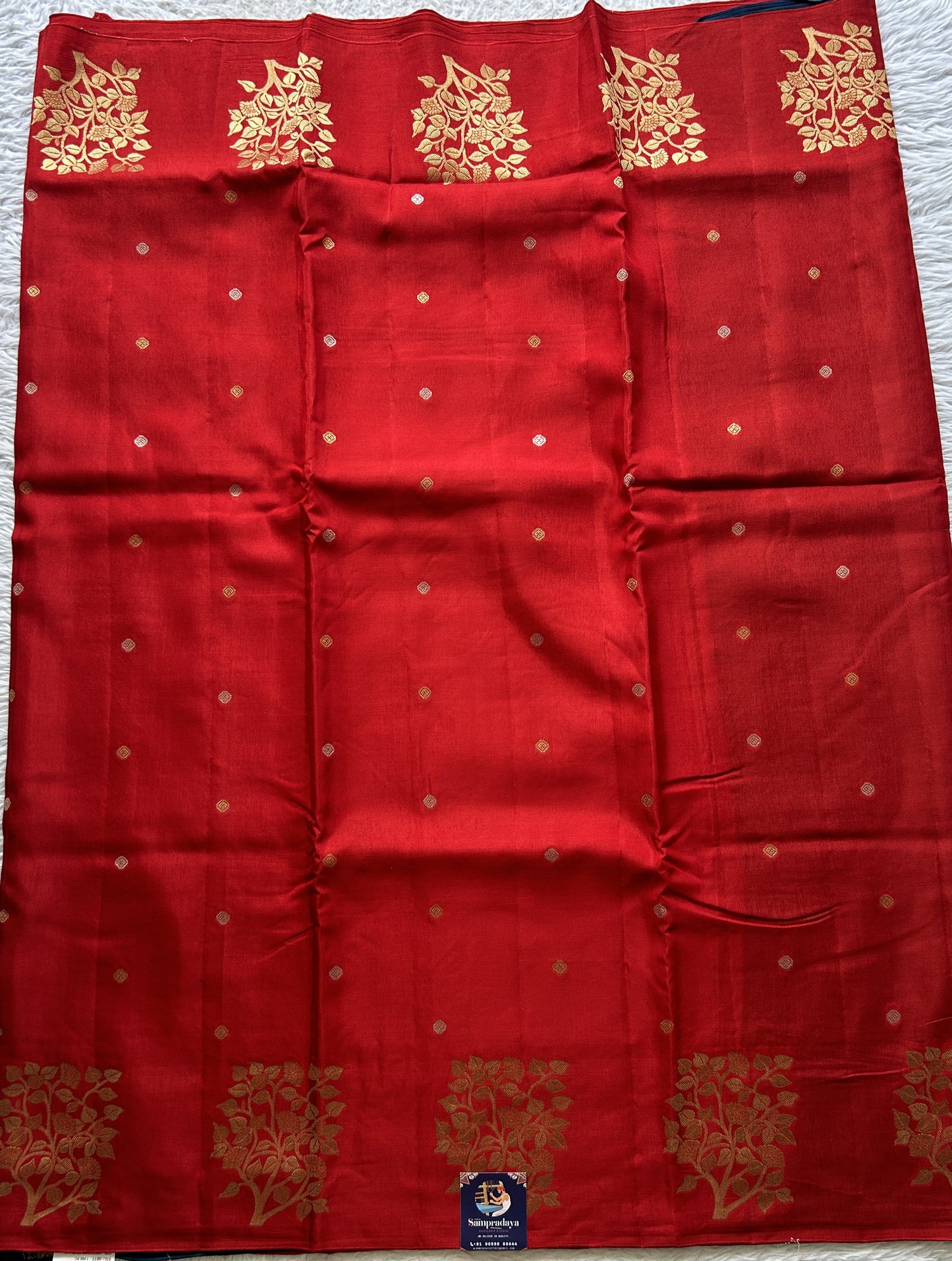 Mona Silk Saree Red Colored Complemented with a Buti Border. - Sampradaya Designer Studio
