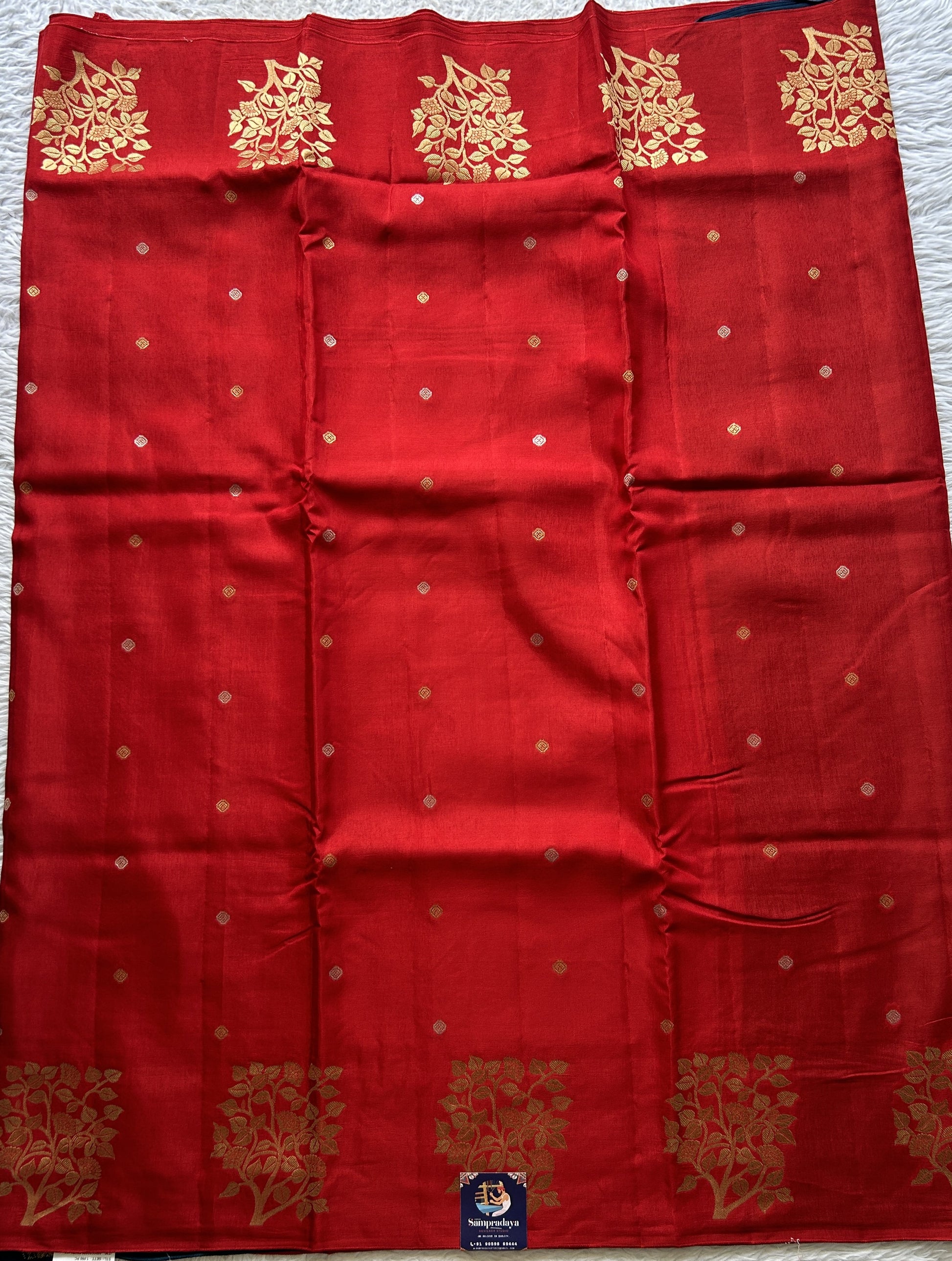 Mona Silk Saree Red Colored Complemented with a Buti Border. - Sampradaya Designer Studio