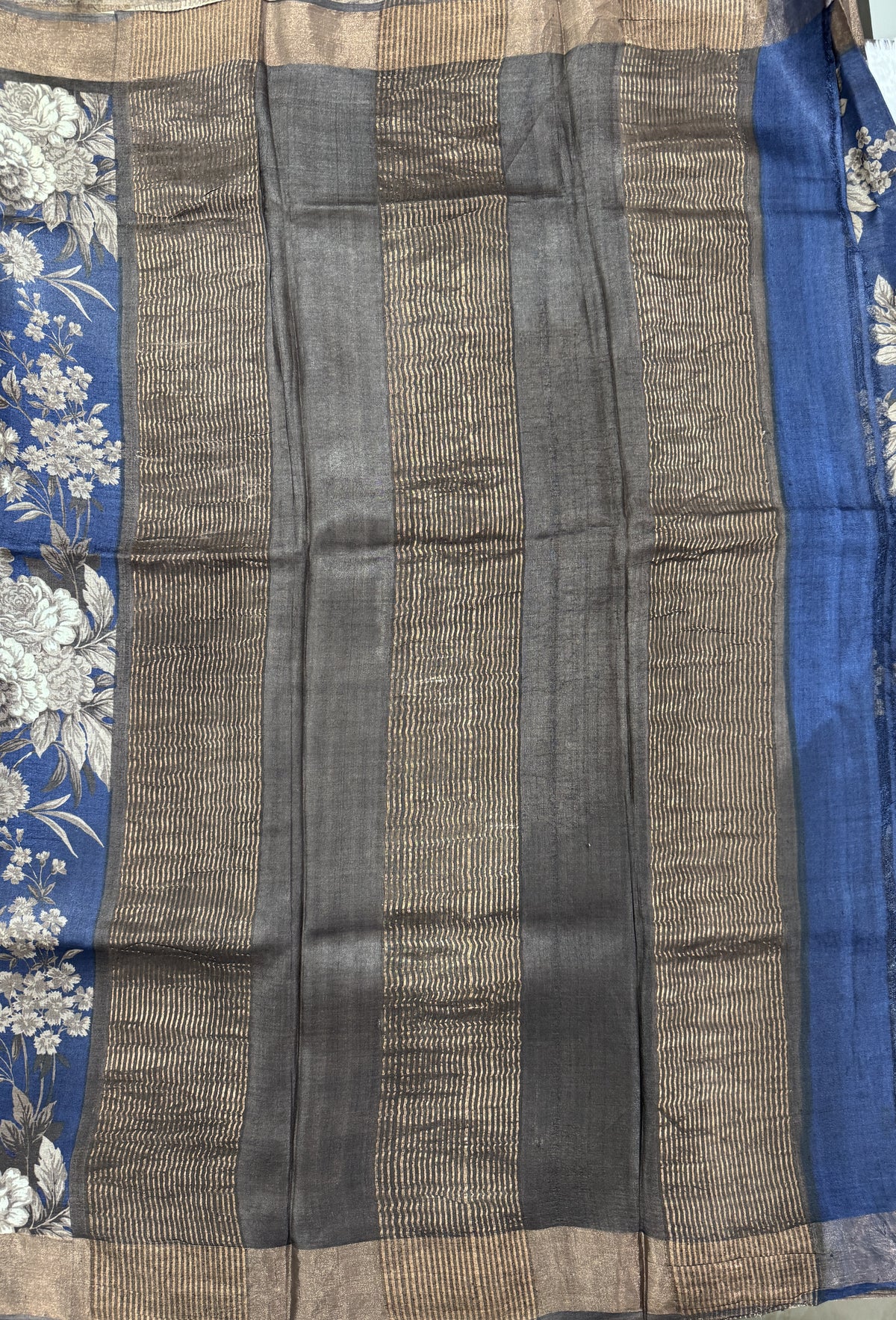 Pure Tussar Silk Saree Navy Blue Color Complemented with a Zari Border.
