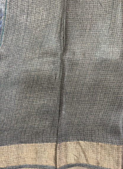 Pure Tussar Silk Saree Navy Blue Color Complemented with a Zari Border.