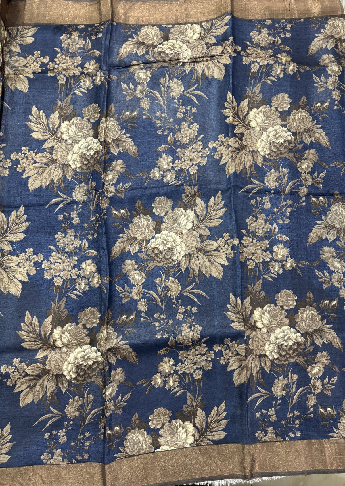 Pure Tussar Silk Saree Navy Blue Color Complemented with a Zari Border.