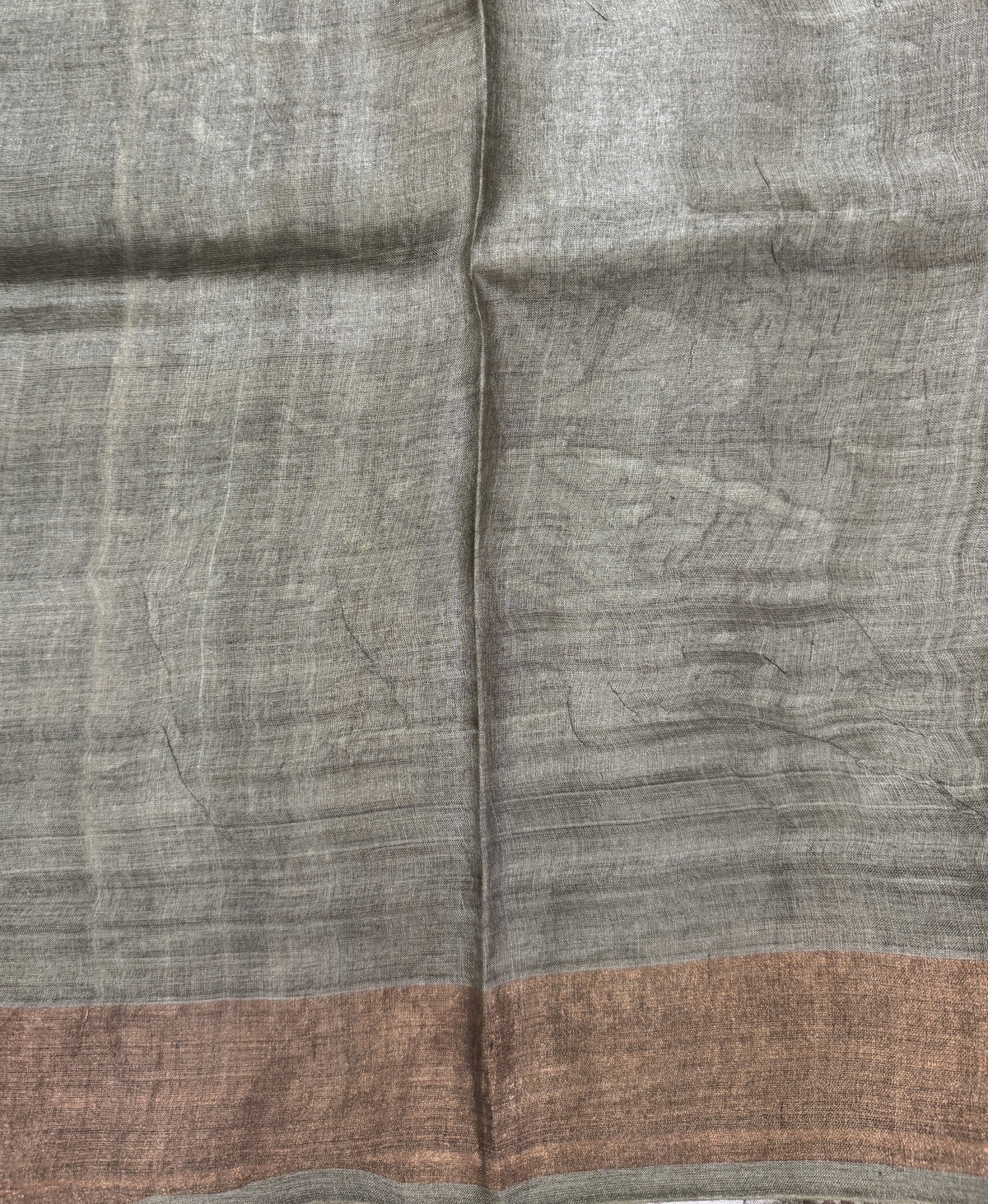 Pure Tussar Silk Saree Light Olive Color Complemented with a Zari Border.