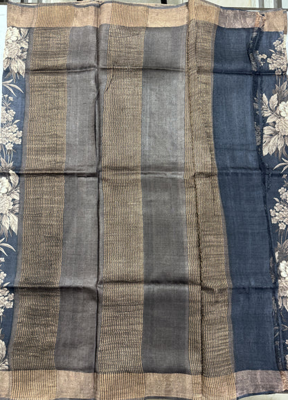 Pure Tussar Silk Saree Black Color Complemented with a Zari Border.