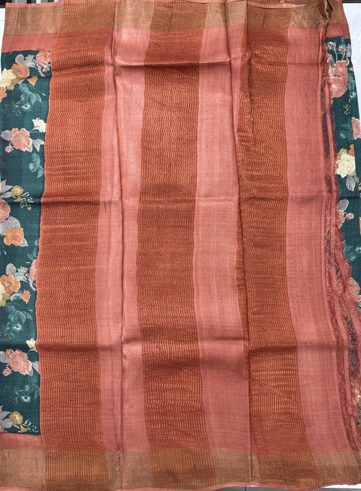 Pure Tussar Silk Saree Teal Green Color Complemented with a Zari Border.