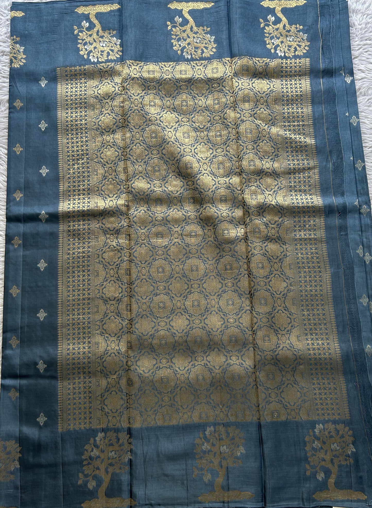 Mona Silk Saree Teal Blue Colored Complemented with a Buti Border. - Sampradaya Designer Studio