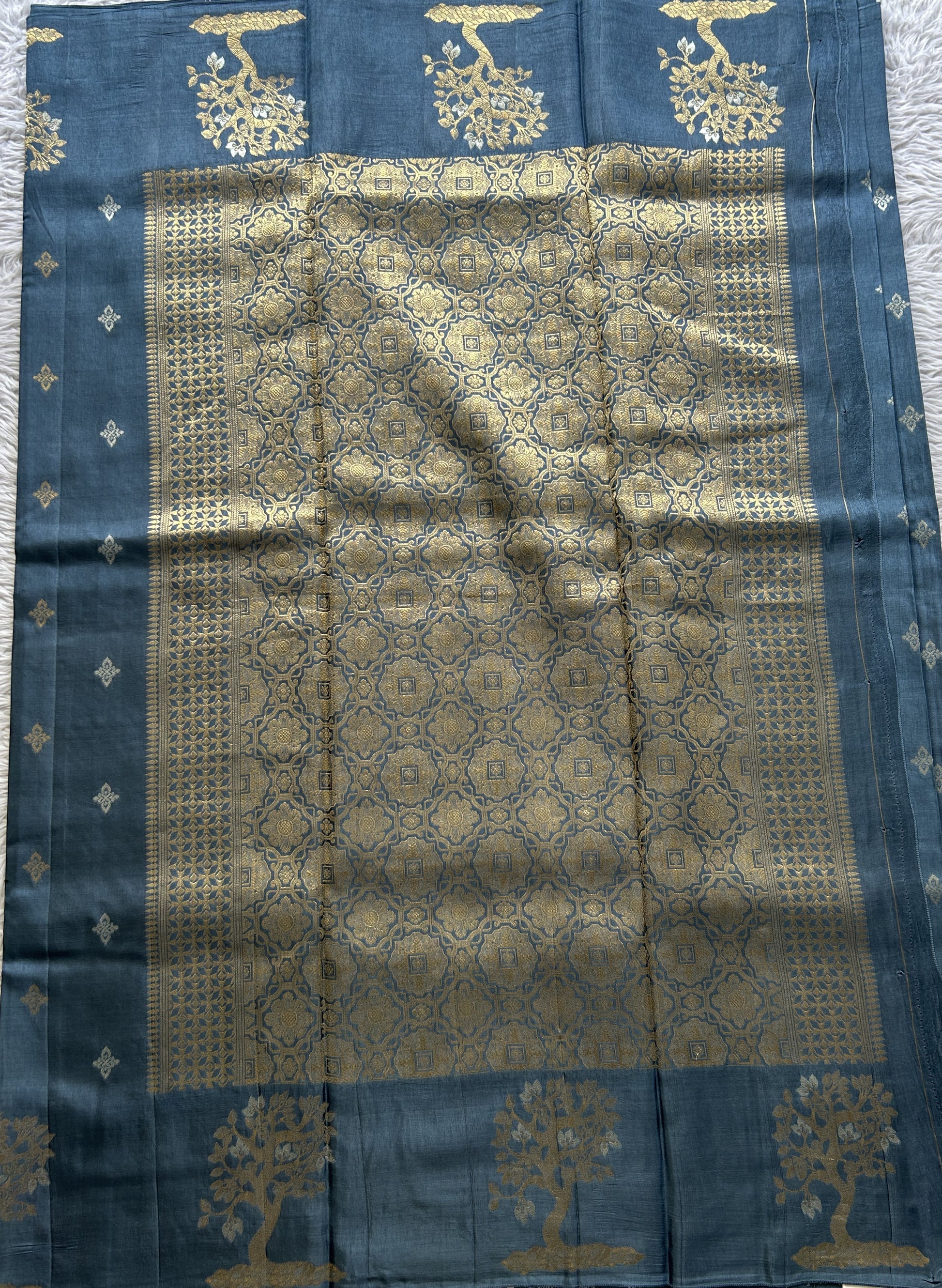 Mona Silk Saree Teal Blue Colored Complemented with a Buti Border. - Sampradaya Designer Studio