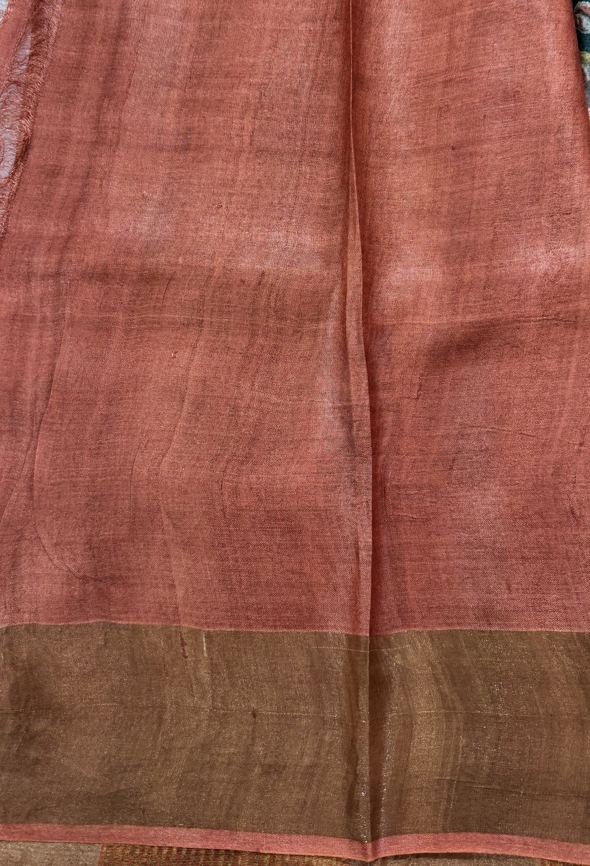 Pure Tussar Silk Saree Teal Green Color Complemented with a Zari Border.