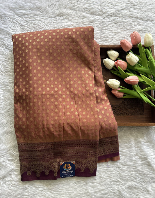 Semi Georgette Saree Peach Colored Complemented with a Zari Border. - Sampradaya Designer Studio