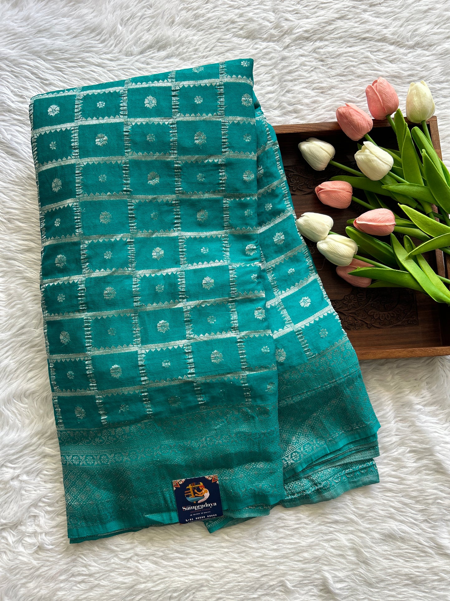 Semi Georgette Saree Turquoise Blue Colored Complemented with a Zari Border. - Sampradaya Designer Studio