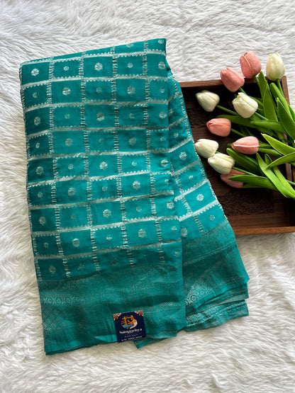Semi Georgette Saree Turquoise Blue Colored Complemented with a Zari Border. - Sampradaya Designer Studio