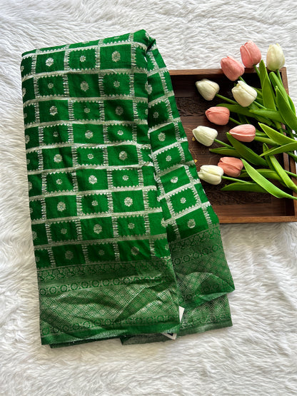 Semi Georgette Saree Green Colored Complemented with a Zari Border. - Sampradaya Designer Studio