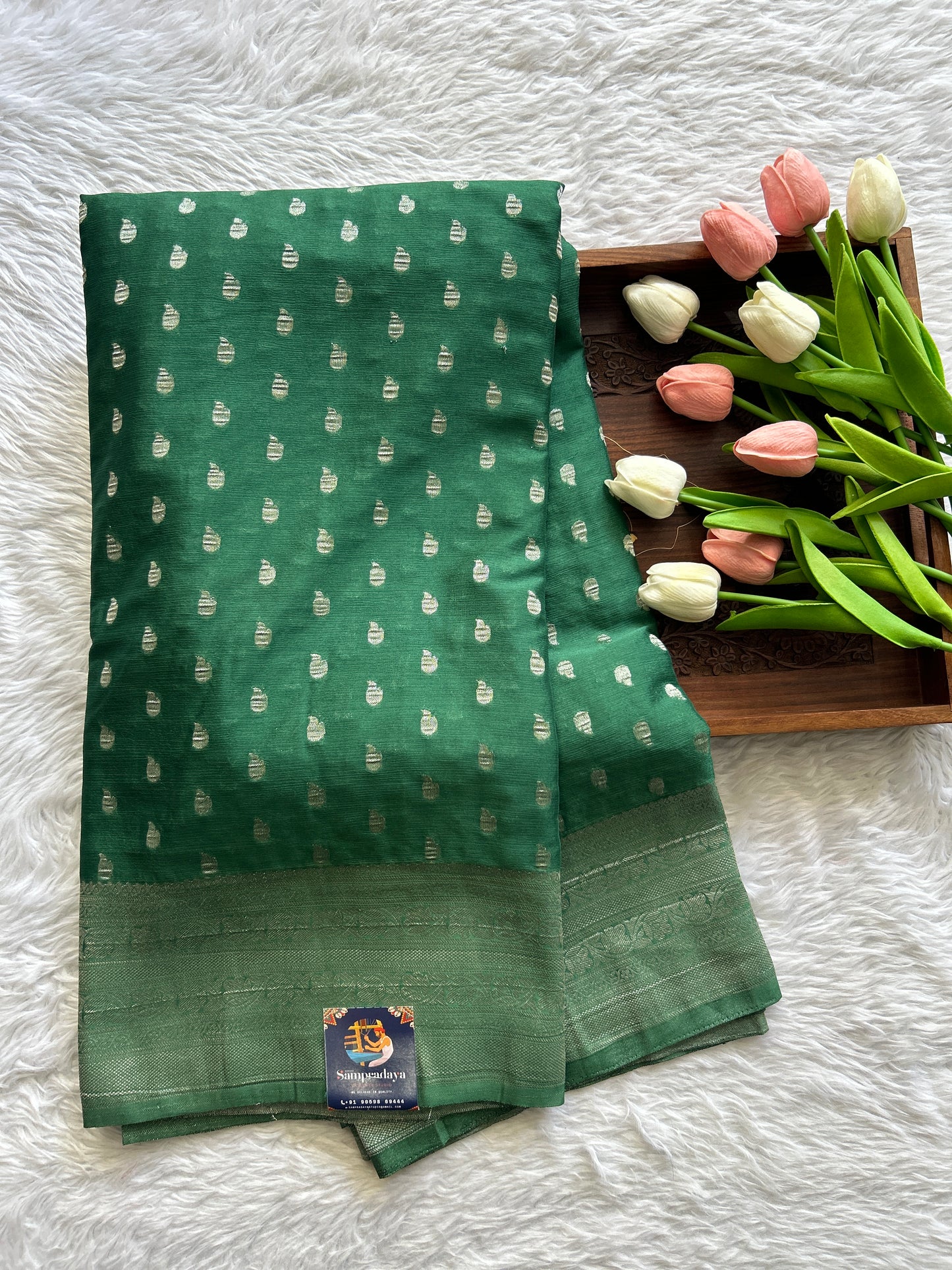 Semi Georgette Saree Green Colored Complemented with a Zari Border. - Sampradaya Designer Studio
