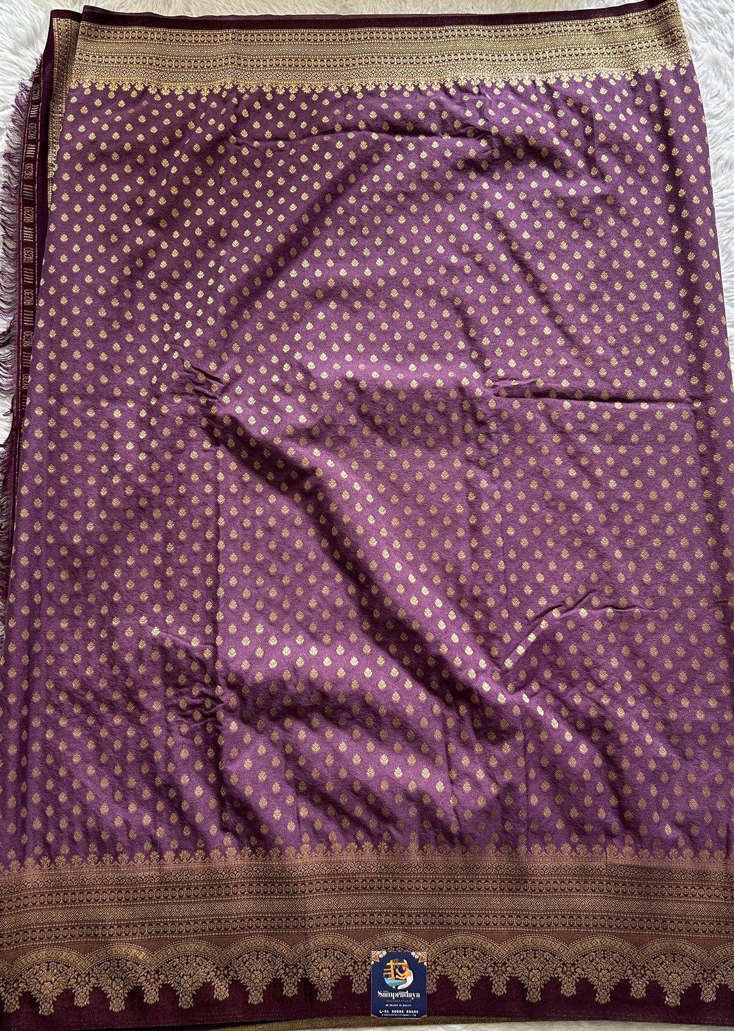 Semi Georgette Saree Lavender Colored Complemented with a Zari Border. - Sampradaya Designer Studio
