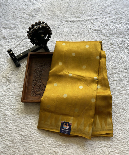 Banarasi Tussar Georgette Saree Yellow Colored Complemented with a Temple Border. - Sampradaya Designer Studio