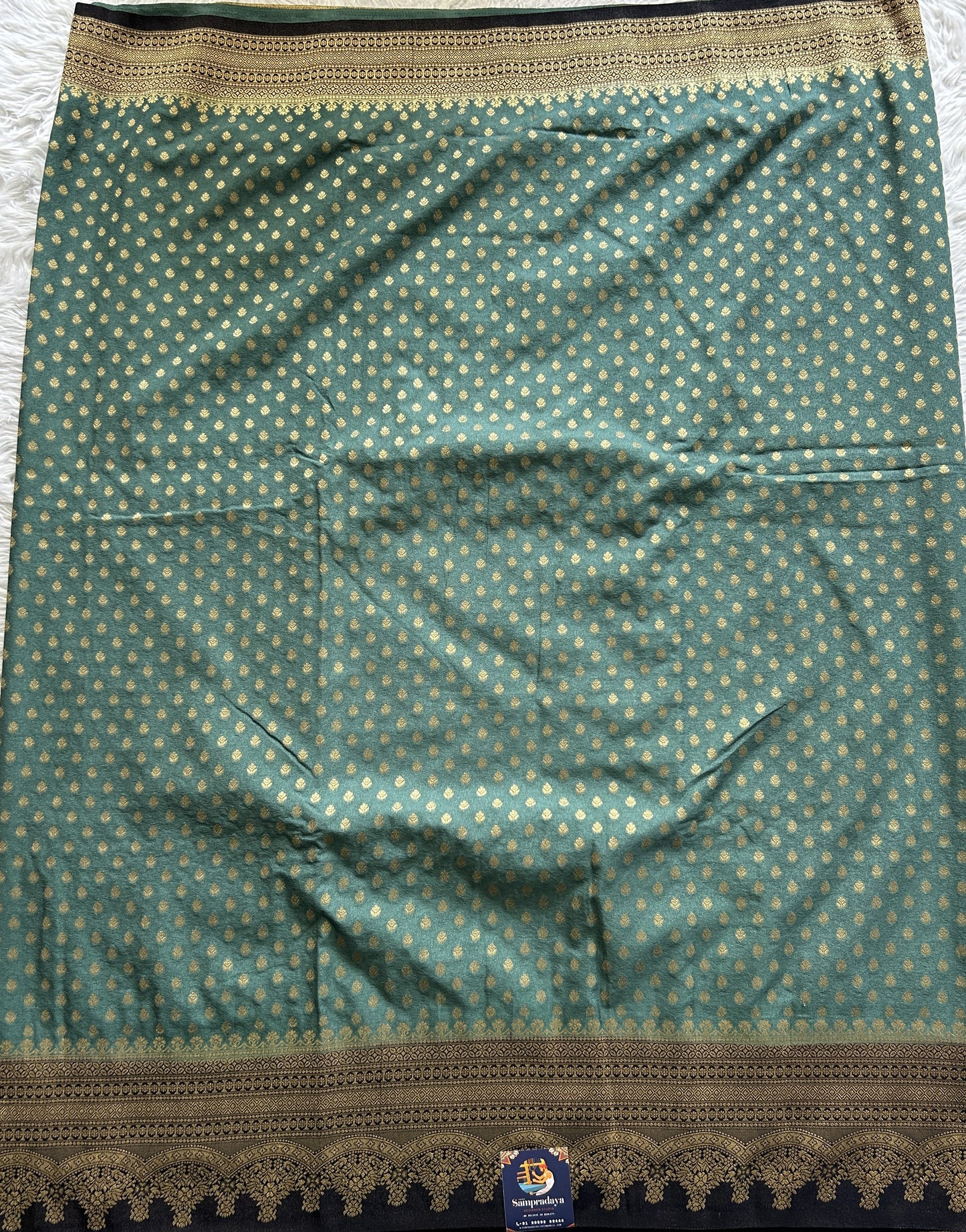Semi Georgette Saree Aqua Blue Colored Complemented with a Zari Border. - Sampradaya Designer Studio