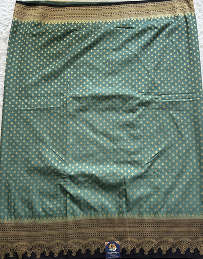 Semi Georgette Saree Aqua Blue Colored Complemented with a Zari Border. - Sampradaya Designer Studio