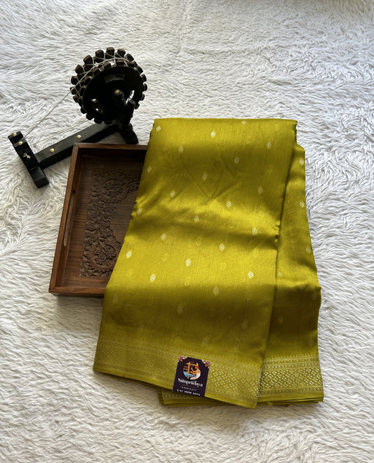 Banarasi Tussar Georgette Saree Pear Colored Paired with a Zari Border. - Sampradaya Designer Studio