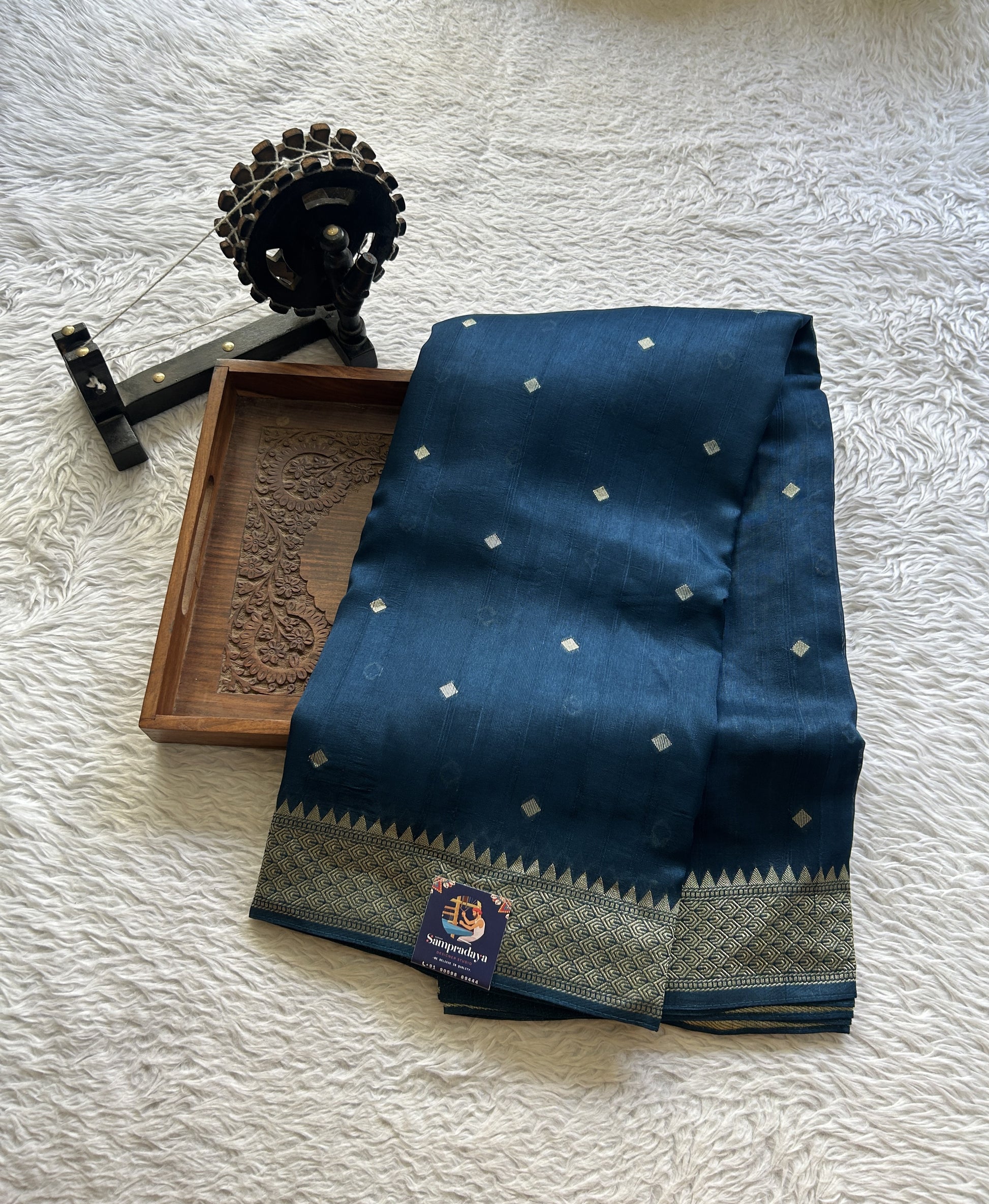 Banarasi Tussar Georgette Saree Peacock Blue Colored Paired with a Zari Border. - Sampradaya Designer Studio