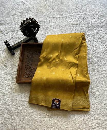 Banarasi Tussar Georgette Saree Mustard Yellow Colored Paired with a Zari Border. - Sampradaya Designer Studio