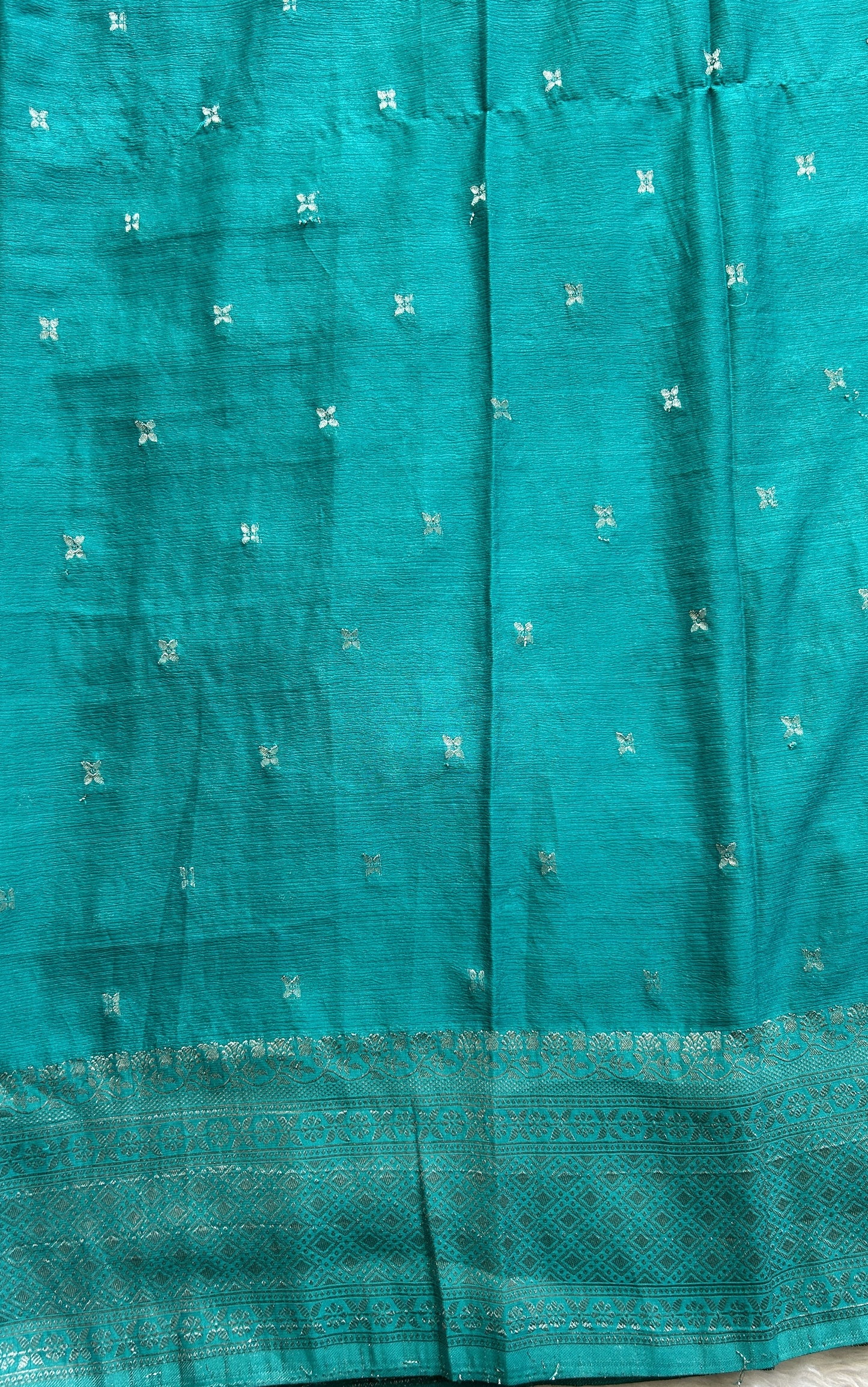 Semi Georgette Saree Turquoise Blue Colored Complemented with a Zari Border. - Sampradaya Designer Studio