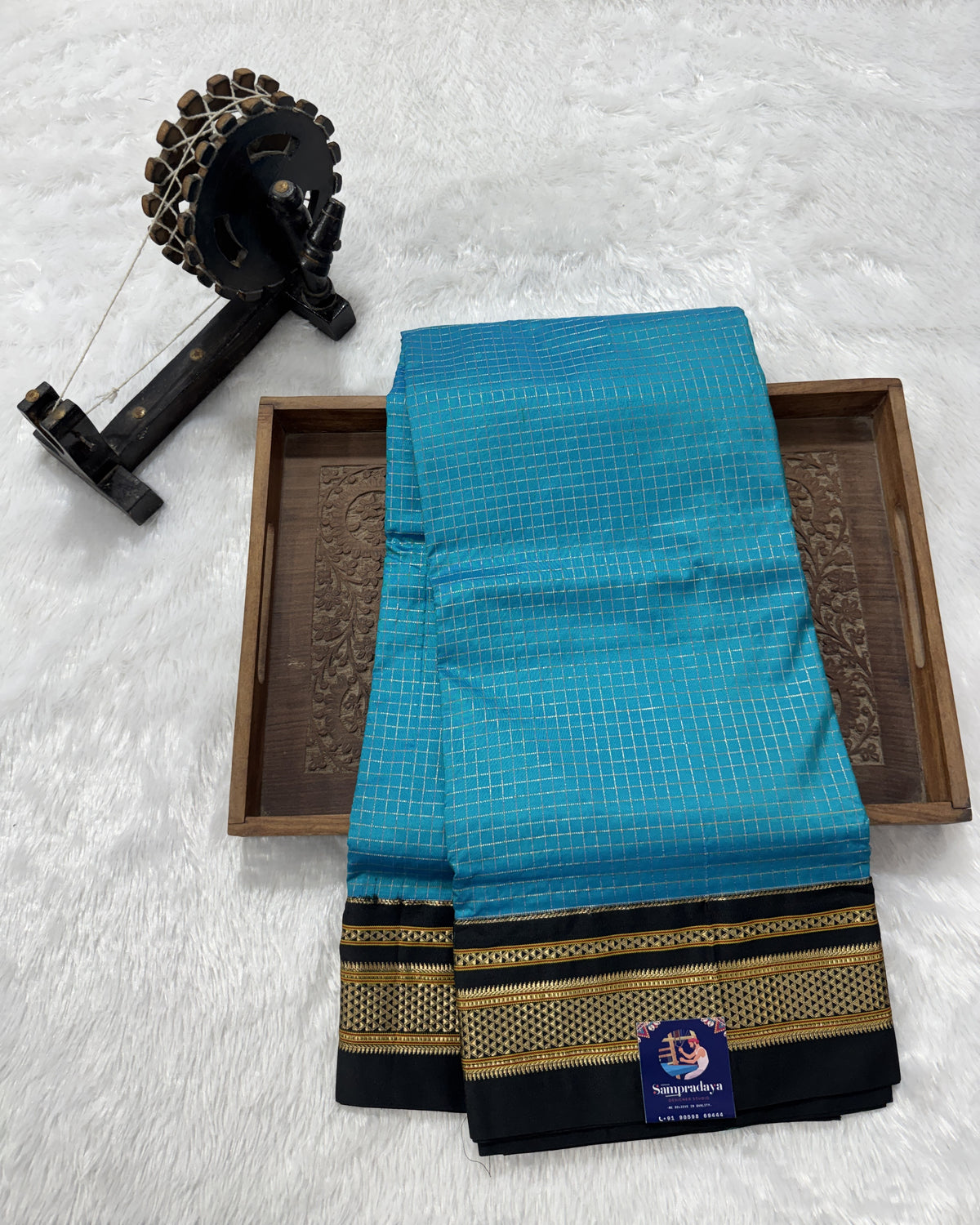 Narayanpet Silk Saree  Blue Colored Complemented with a Black Zari Border.